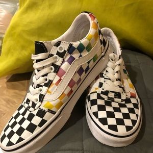 Size 7.5 women’s/6 men’s rainbow checkered Vans